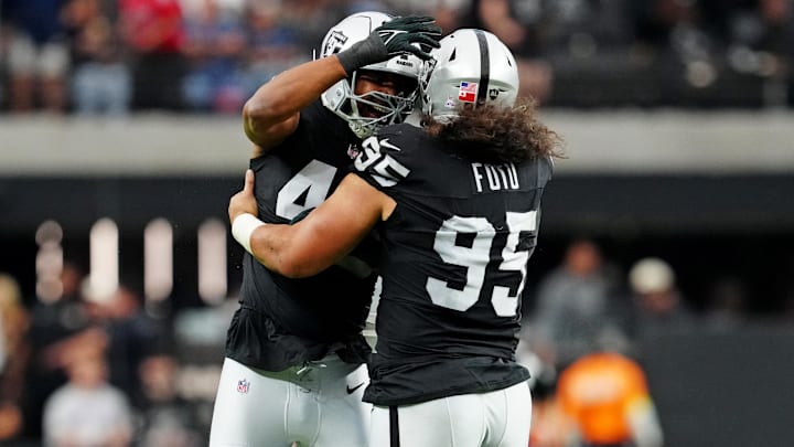 Oct 12, 2025; Paradise, Nevada, USA; Las Vegas Raiders defensive tackle Thomas Booker (99) reacts after a play during the second half against the Tennessee Titans at Allegiant Stadium. Mandatory Credit: Stephen R. Sylvanie-Imagn Images