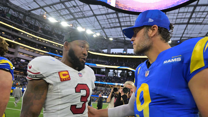 Jan 4, 2026; Inglewood, California, USA;  Arizona Cardinals safety Budda Baker (3) and Los Angeles Rams quarterback Matthew Stafford (9) talk following a game at SoFi Stadium. Mandatory Credit: Jayne Kamin-Oncea-Imagn Images