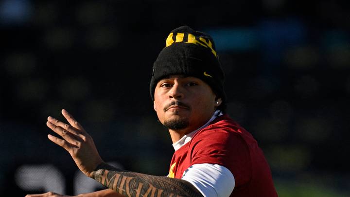 Nov 22, 2025; Eugene, Oregon, USA; Southern California Trojans quarterback Jayden Maiava (14) warms up before the game against the Oregon Ducks at Autzen Stadium. 