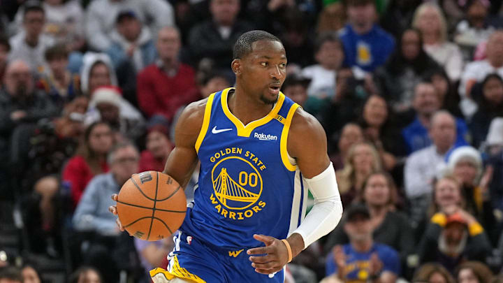 Dec 25, 2024; San Francisco, California, USA; Golden State Warriors forward Jonathan Kuminga (00) dribbles against the Los Angeles Lakers during the fourth quarter at Chase Center. Mandatory Credit: Darren Yamashita-Imagn Images