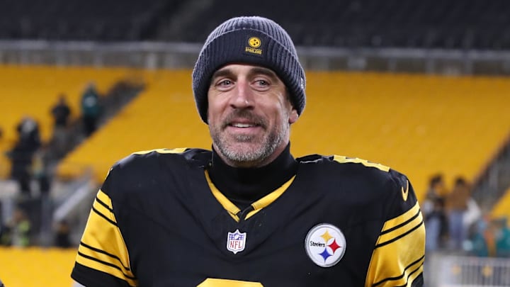 Dec 15, 2025; Pittsburgh, Pennsylvania, USA; Pittsburgh Steelers quarterback Aaron Rodgers (8) runs off the field after the game against the Miami Dolphins at Acrisure Stadium.