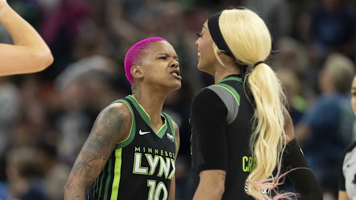 Sep 14, 2025; Minneapolis, Minnesota, USA; Minnesota Lynx guard Courtney Williams (10) celebrates with Minnesota Lynx guard DiJonai Carrington (3) after making a shot against the Golden State Valkyries in the second half during game one of round one for the 2025 WNBA Playoffs at Target Center. Mandatory Credit: Jesse Johnson-Imagn Images