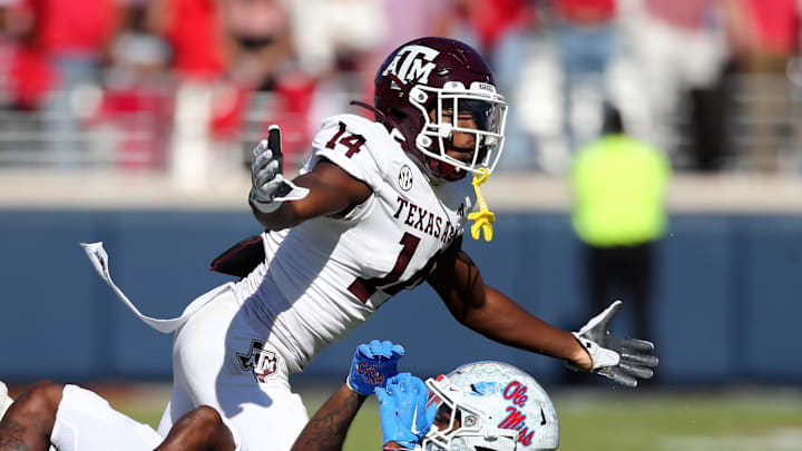 Nov 4, 2023; Oxford, Mississippi, USA; Texas A&M Aggies defensive back Jayvon Thomas (14) reacts after being called for pass interference against Mississippi Rebels wide receiver Dayton Wade (19) during the second half at Vaught-Hemingway Stadium. Mandatory Credit: Petre Thomas-Imagn Images