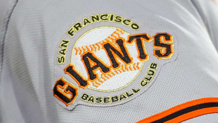 The San Francisco Giants logo on the sleeve of a baseball jersey.