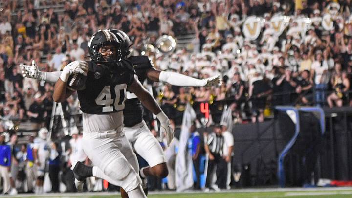 Sep 20, 2025; Nashville, Tennessee, USA; Vanderbilt Commodores linebacker Jamison Curtis (40) scores on a block punt against the Georgia State Panthers during the second half at FirstBank Stadium. Mandatory Credit: Steve Roberts-Imagn Images Sep 20, 2025; Nashville, Tennessee, USA; Vanderbilt Commodores linebacker Jamison Curtis (40) scores on a block punt against the Georgia State Panthers during the second half at FirstBank Stadium. Mandatory Credit: Steve Roberts-Imagn Images