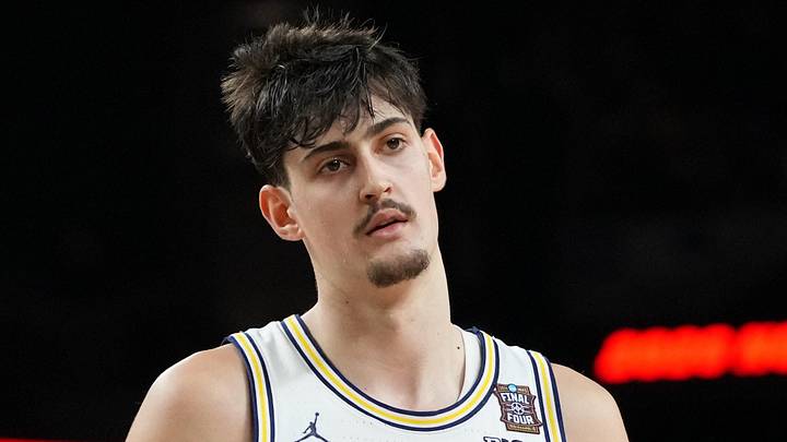 Michigan Wolverines center Aday Mara (15) reacts after a play against the UConn Huskies during the Final Four of the 2026 NCAA Tournament.