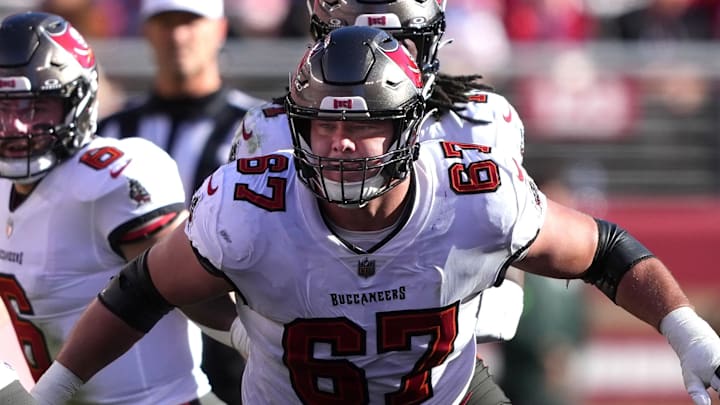 Nov 19, 2023; Santa Clara, California, USA; Tampa Bay Buccaneers offensive tackle Luke Goedeke (67) blocks against San Francisco 49ers linebacker Fred Warner (54) during the second quarter at Levi's Stadium. Mandatory Credit: Darren Yamashita-Imagn Images Nov 19, 2023; Santa Clara, California, USA; Tampa Bay Buccaneers offensive tackle Luke Goedeke (67) blocks against San Francisco 49ers linebacker Fred Warner (54) during the second quarter at Levi's Stadium. Mandatory Credit: Darren Yamashita-Imagn Images