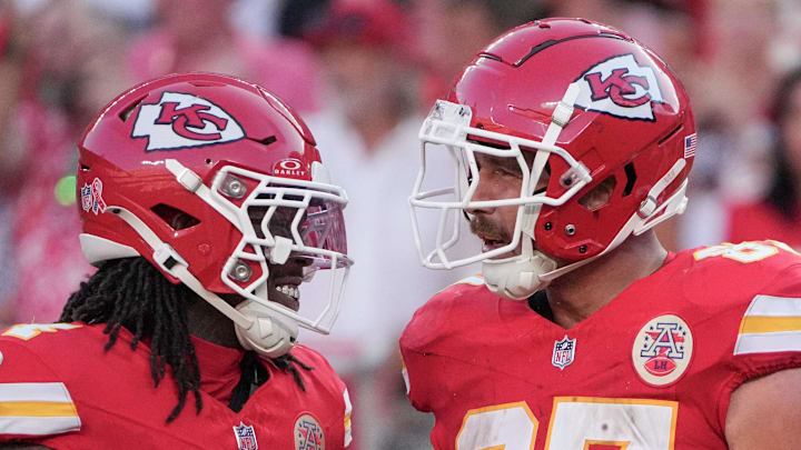 Sep 15, 2024; Kansas City, Missouri, USA; Kansas City Chiefs tight end Travis Kelce (87) celebrates with wide receiver Rashee Rice (4) after a play against the Cincinnati Bengals during the game at GEHA Field at Arrowhead Stadium. Mandatory Credit: Denny Medley-Imagn Images