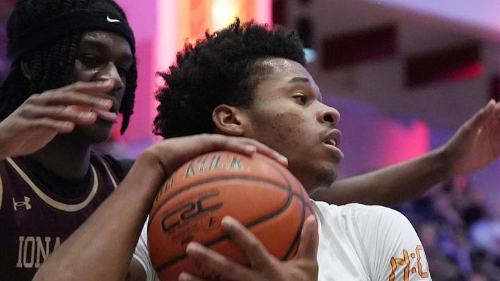 Stepinac’s Jasiah Jervis (25) tries to get around Iona Prep’s Elijah Joseph (13) during basketball action in the Crusader Classic at the Westchester County Center Jan. 3, 2026. Stepinac’s Jasiah Jervis (25) tries to get around Iona Prep’s Elijah Joseph (13) during basketball action in the Crusader Classic at the Westchester County Center Jan. 3, 2026.