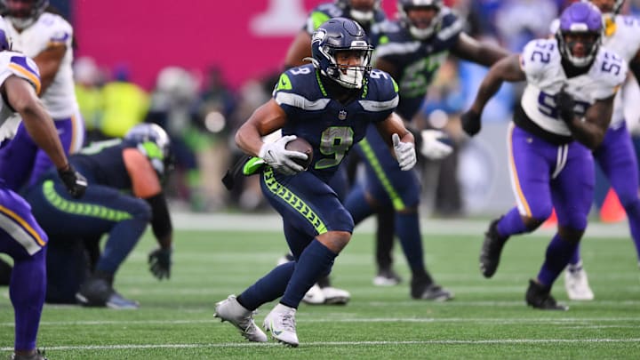Seattle Seahawks RB Kenneth Walker III carries the ball against the Minnesota Vikings during the second half at Lumen Field.