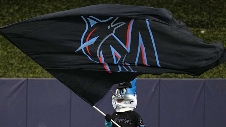 Miami Marlins mascot waves a flag