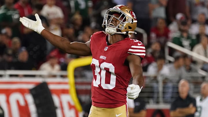 Sep 9, 2024; Santa Clara, California, USA; San Francisco 49ers safety George Odum (30) celebrates in the fourth quarter against the New York Jets at Levi's Stadium. Mandatory Credit: David Gonzales-Imagn Images