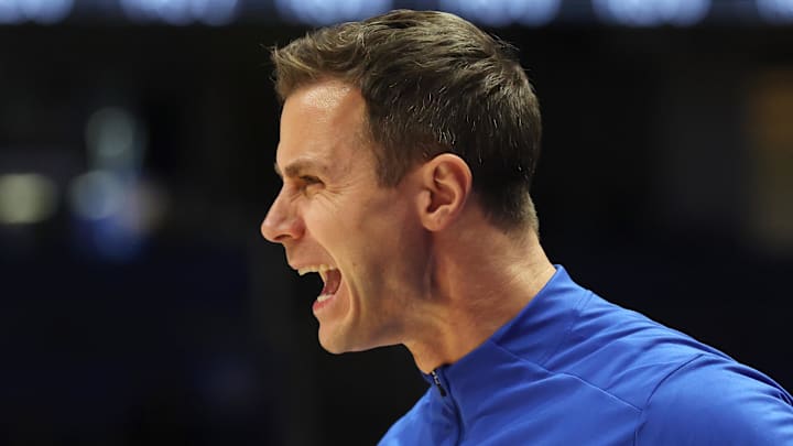 Feb 10, 2026; Pittsburgh, Pennsylvania, USA;  Duke Blue Devils head coach Jon Scheyer reacts on the court against the Pittsburgh Panthers during the first half at Petersen Events Center. Mandatory Credit: Charles LeClaire-Imagn Images
