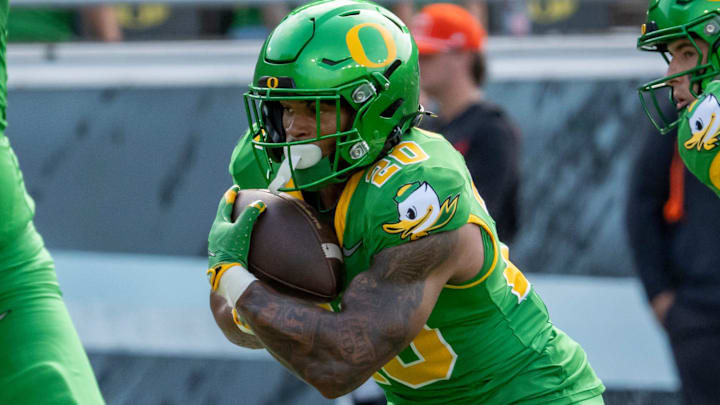 Oregon running back Makhi Hughes carries the ball as the Oregon Ducks host the Oklahoma State Cowboys on Sept. 6, 2025, at Autzen Stadium in Eugene, Oregon.