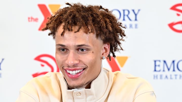 Dyson Daniels #5 of the Atlanta Hawks speaks with reporters.