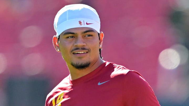 Oct 11, 2025; Los Angeles, California, USA;  USC Trojans quarterback Jayden Maiava (14) warms up prior to the game against the Michigan Wolverines at United Airlines Field at the Los Angeles Memorial Coliseum. Mandatory Credit: Jayne Kamin-Oncea-Imagn Images