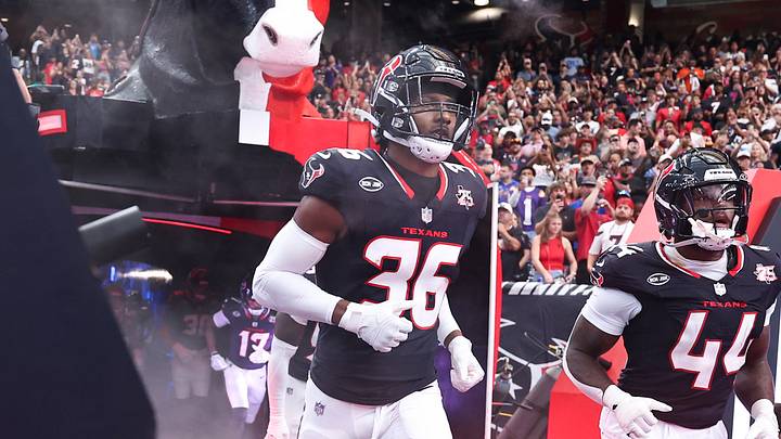 Sep 20, 2026; Houston, Texas, USA; Houston Texans safety George Odum (36) and running back British Brooks (44) run onto the field before the game against the Cincinnati Bengals at Reliant Stadium. Mandatory Credit: Troy Taormina-Imagn Images