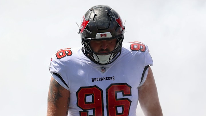 Sep 22, 2024; Tampa, Florida, USA; Tampa Bay Buccaneers defensive tackle Greg Gaines (96) is introduced before a game against the Denver Broncos at Raymond James Stadium. Mandatory Credit: Nathan Ray Seebeck-Imagn Images