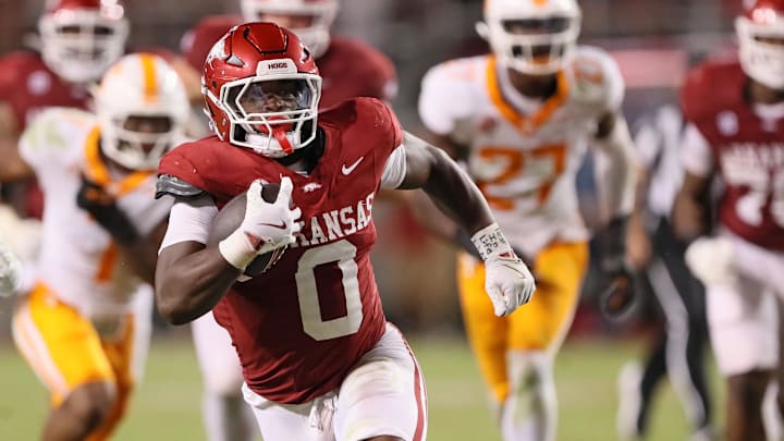 Arkansas Razorbacks running back Braylen Russell (0) rushes in the fourth quarter against the Tennessee Volunteers at Donald W. Reynolds Razorback Stadium. Arkansas won 19-14. 