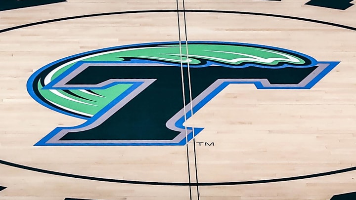 Feb 8, 2017; New Orleans, LA, USA; Devlin Fieldhouse logo at midcourt before the game between Houston Cougars and Tulane Green Wave at Devlin Fieldhouse. Feb 8, 2017; New Orleans, LA, USA; Devlin Fieldhouse logo at midcourt before the game between Houston Cougars and Tulane Green Wave at Devlin Fieldhouse.
