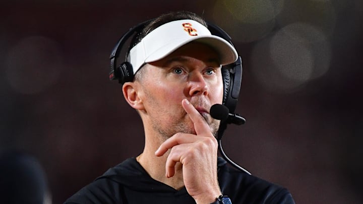 Nov 7, 2025; Los Angeles, California, USA; Southern California Trojans head coach Lincoln Riley watches game action against the Northwestern Wildcats during the second half at the Los Angeles Memorial Coliseum. Mandatory Credit: Gary A. Vasquez-Imagn Images