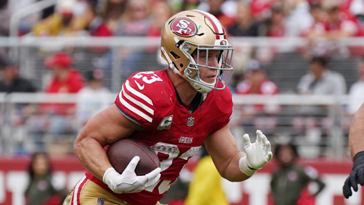 Nov 17, 2024; Santa Clara, California, USA; San Francisco 49ers running back Christian McCaffrey (23) rushes the ball against the Seattle Seahawks in the second quarter at Levi's Stadium. Mandatory Credit: David Gonzales-Imagn Images