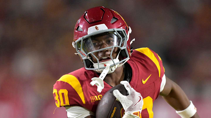Sep 6, 2025; Los Angeles, California, USA; USC Trojans running back King Miller (30) carries the ball down the field for a touchdown in the second half against the Georgia Southern Eagles at the Los Angeles Memorial Coliseum. Mandatory Credit: Jayne Kamin-Oncea-Imagn Images