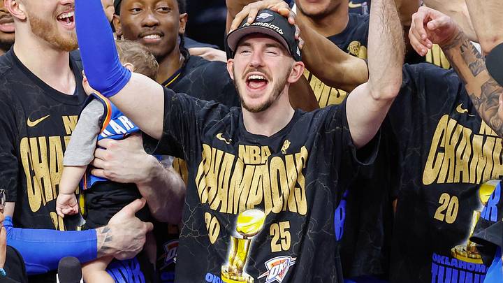 Jun 22, 2025; Oklahoma City, Oklahoma, USA; Oklahoma City Thunder guard Alex Caruso (9) during the NBA Championship trophy presentation after game seven of the 2025 NBA Finals against the Indiana Pacers at Paycom Center. Mandatory Credit: Alonzo Adams-Imagn Images Jun 22, 2025; Oklahoma City, Oklahoma, USA; Oklahoma City Thunder guard Alex Caruso (9) during the NBA Championship trophy presentation after game seven of the 2025 NBA Finals against the Indiana Pacers at Paycom Center. Mandatory Credit: Alonzo Adams-Imagn Images