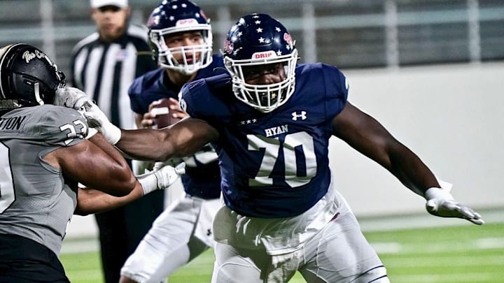 Denton Ryan offensive lineman Ty Haywood (70) delivers a block during a 2023 game.