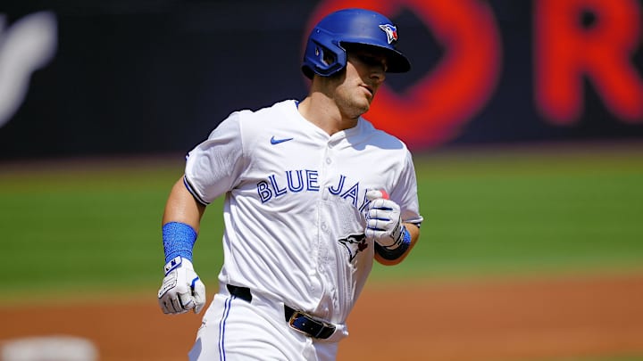 Jul 28, 2024; Toronto, Ontario, CAN; Toronto Blue Jays left fielder Daulton Varsho (25) heads for home on his two run home run against the Texas Rangers during the first inning at Rogers Centre. 