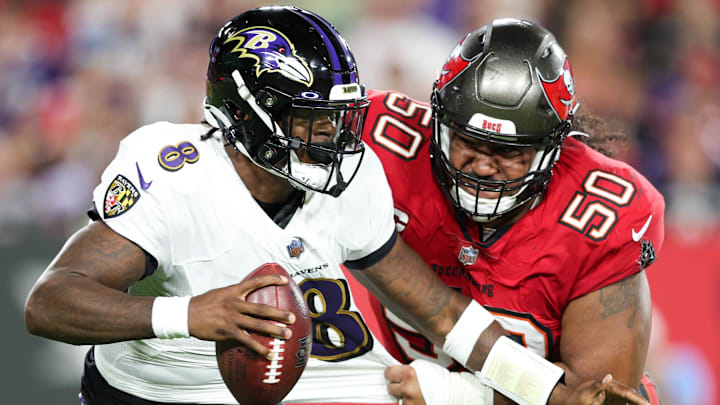 Oct 27, 2022; Tampa, Florida, USA;  Baltimore Ravens quarterback Lamar Jackson (8) is sacked by Tampa Bay Buccaneers defensive tackle Vita Vea (50) in the first quarter at Raymond James Stadium. Mandatory Credit: Nathan Ray Seebeck-Imagn Images
