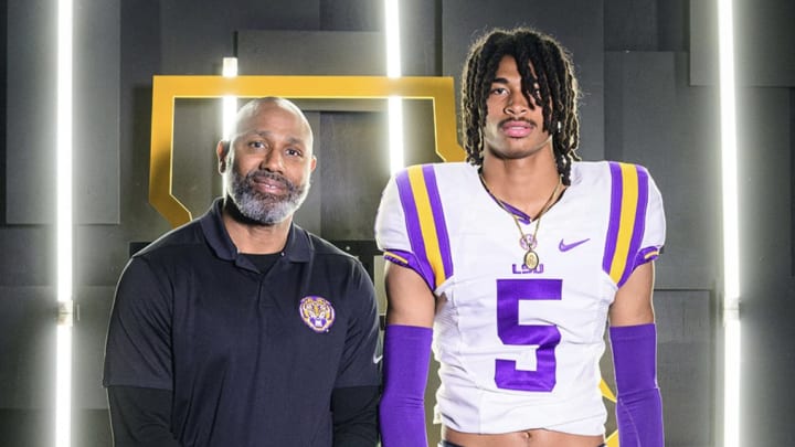 DJ Pickett with LSU secondary coach Corey Raymond during a visit to Baton Rouge.