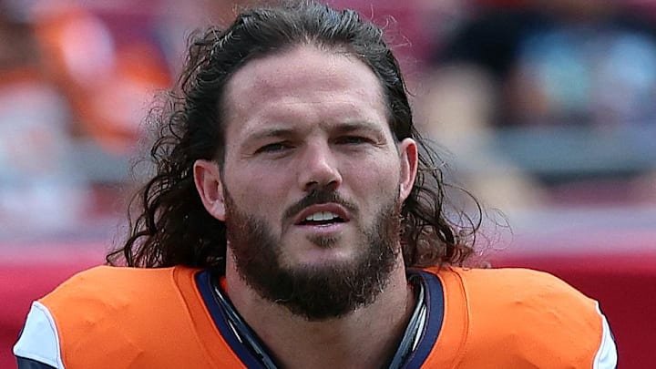 Sep 22, 2024; Tampa, Florida, USA; Denver Broncos linebacker Alex Singleton (49) works out prior the game against the Tampa Bay Buccaneers at Raymond James Stadium. Mandatory Credit: Kim Klement Neitzel-Imagn Images