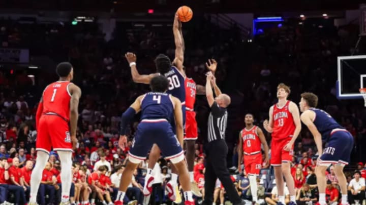 Carter Bryant and Conrad Martinez tip off in last years Red/Blue scrimmage. Carter Bryant and Conrad Martinez tip off in last years Red/Blue scrimmage.