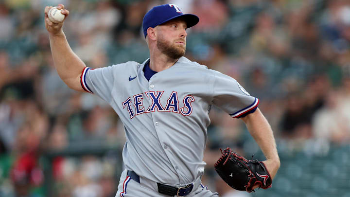 Aug 30, 2025; West Sacramento, California, USA; Texas Rangers starting pitcher Merrill Kelly (23) throws a pitch against the Athletics during the first inning at Sutter Health Park. Mandatory Credit: Dennis Lee-Imagn Images