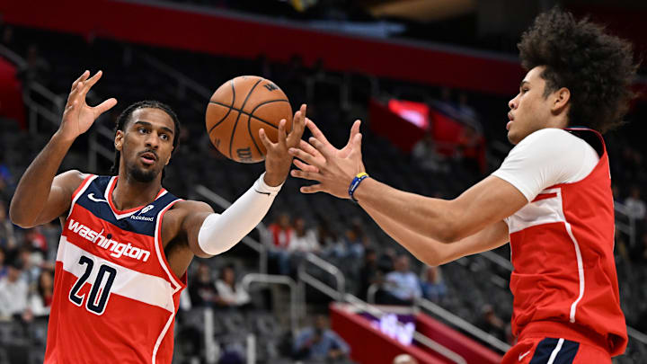 Oct 16, 2025; Detroit, Michigan, USA; Washington Wizards center Alex Sarr (20) and forward Kyshawn George (18) go for a rebound against the Detroit Pistons in the first quarter at Little Caesars Arena. Mandatory Credit: Lon Horwedel-Imagn Images Oct 16, 2025; Detroit, Michigan, USA; Washington Wizards center Alex Sarr (20) and forward Kyshawn George (18) go for a rebound against the Detroit Pistons in the first quarter at Little Caesars Arena. Mandatory Credit: Lon Horwedel-Imagn Images