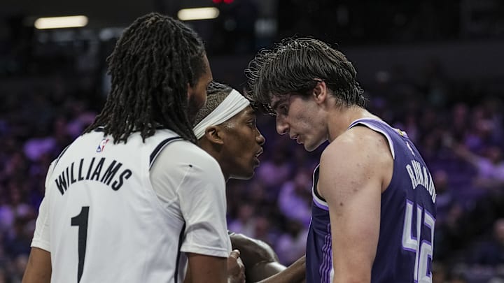 Mar 22, 2026; Sacramento, California, USA; Brooklyn Nets guard Terance Mann (14) and Sacramento Kings center Maxime Raynaud (42) get into an argument during the third quarter at Golden 1 Center. Mandatory Credit: Justine Willard-Imagn Images