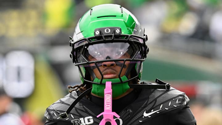 Oct 11, 2025; Eugene, Oregon, USA; Oregon Ducks wide receiver Dakorien Moore (1) warms up before the game against the Indiana Hoosiers at Autzen Stadium. Mandatory Credit: Troy Wayrynen-Imagn Images