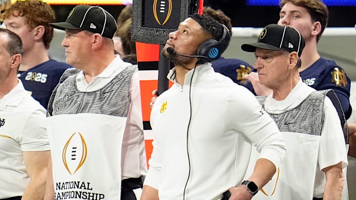 Notre Dame Fighting Irish head coach Marcus Freeman watches a replay in the second quarter against Ohio State Buckeyes during the College Football Playoff National Championship at Mercedes-Benz Stadium in Atlanta on January 20, 2025.