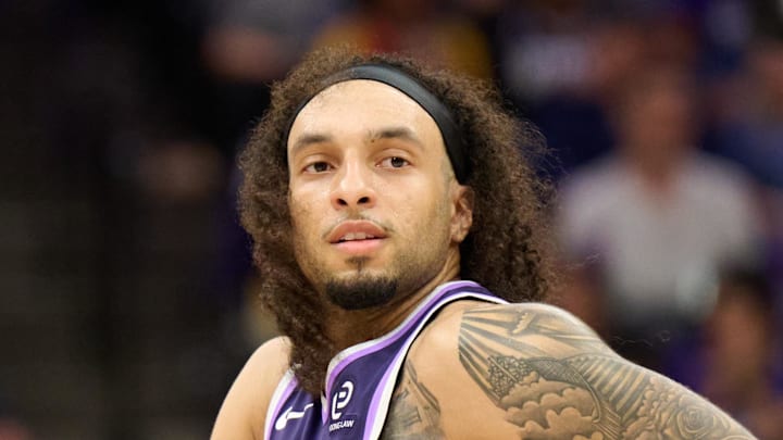 Apr 10, 2026; Sacramento, California, USA; Sacramento Kings guard Devin Carter (22) runs back on defense against the Golden State Warriors during the fourth quarter at Golden 1 Center. Mandatory Credit: Robert Edwards-Imagn Images