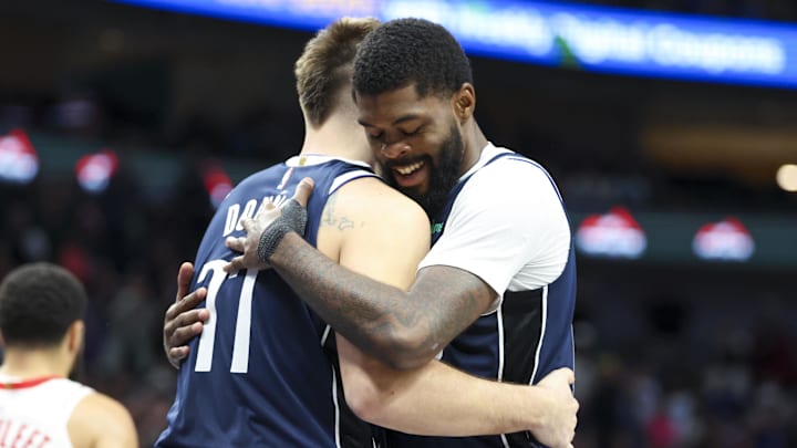 Oct 31, 2024; Dallas, Texas, USA; Dallas Mavericks guard Luka Doncic (77) hugs Dallas Mavericks forward Naji Marshall (13) after scoring during the second half against the Houston Rockets at American Airlines Center. Mandatory Credit: Kevin Jairaj-Imagn Images Oct 31, 2024; Dallas, Texas, USA; Dallas Mavericks guard Luka Doncic (77) hugs Dallas Mavericks forward Naji Marshall (13) after scoring during the second half against the Houston Rockets at American Airlines Center. Mandatory Credit: Kevin Jairaj-Imagn Images
