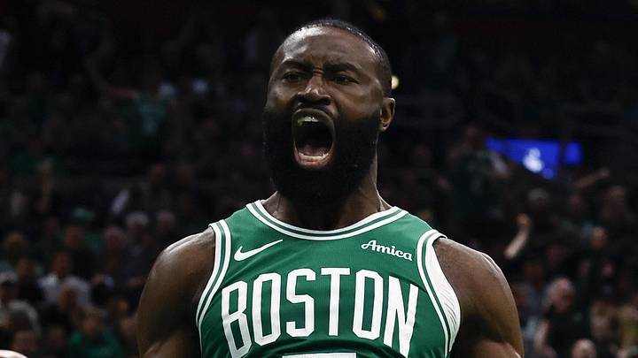 Apr 23, 2025; Boston, Massachusetts, USA; Boston Celtics guard Jaylen Brown (7) shouts out after dunking as Orlando Magic forward Paolo Banchero (5) turns away during the second half of game two of the first round of the 2024 NBA Playoffs at TD Garden. Mandatory Credit: Winslow Townson-Imagn Images