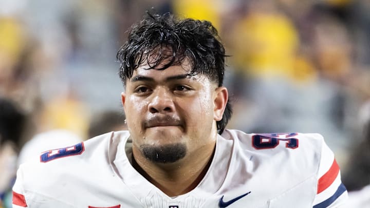 Nov 28, 2025; Tempe, Arizona, USA; Arizona Wildcats defensive lineman Mays Pese (99) against the Arizona State Sun Devils during the 99th Territorial Cup at Mountain America Stadium. Mandatory Credit: Mark J. Rebilas-Imagn Images