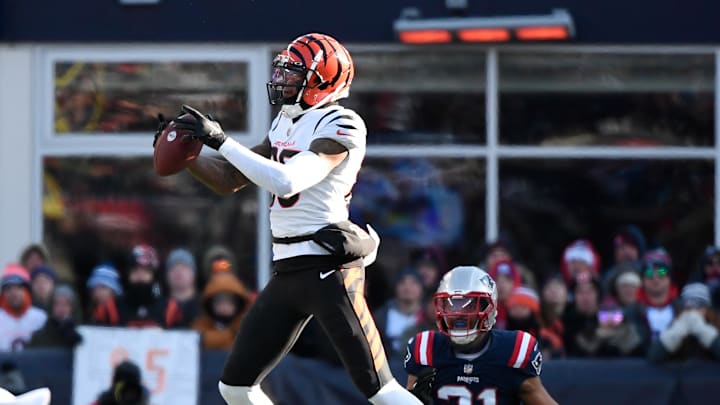 Dec 24, 2022; Foxborough, Massachusetts, USA; Cincinnati Bengals wide receiver Tee Higgins (85) makes a catch against the New England Patriots during the first half at Gillette Stadium. Mandatory Credit: Eric Canha-Imagn Images