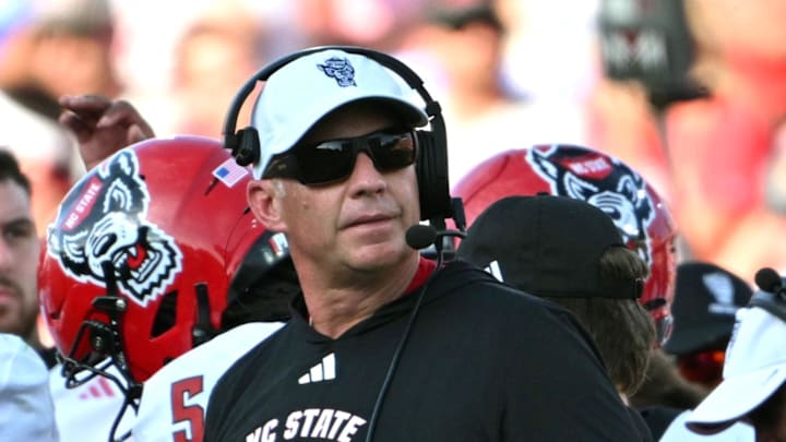 Sep 20, 2025; Durham, North Carolina, USA;  NC State Wolfpack head coach Dave Doeren during the second quarter against the Duke Blue Devils at Wallace Wade Stadium. Mandatory Credit: Zachary Taft-Imagn Images