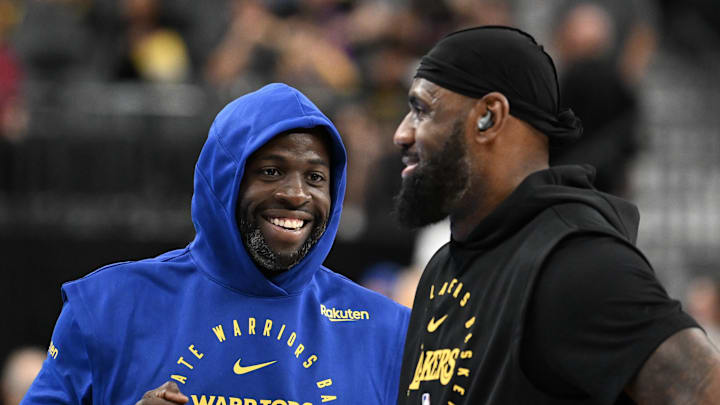 Oct 15, 2024; Las Vegas, Nevada, USA; Golden State Warriors forward Draymond Green (23) and Los Angeles Lakers forward LeBron James (23) talk on court before warm up at T-Mobile Arena. Mandatory Credit: Candice Ward-Imagn Images Oct 15, 2024; Las Vegas, Nevada, USA; Golden State Warriors forward Draymond Green (23) and Los Angeles Lakers forward LeBron James (23) talk on court before warm up at T-Mobile Arena. Mandatory Credit: Candice Ward-Imagn Images