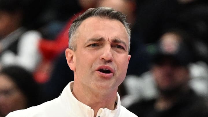 Toronto Raptors head coach Darko Rajakovic reacts to an official's call in the second half against the Utah Jazz.