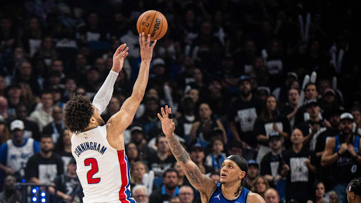 May 1, 2026; Orlando, Florida, USA; Detroit Pistons guard Cade Cunningham (2) shoots the ball over Orlando Magic forward Paolo Banchero (5) in the third quarter during game six of the first round of the 2026 NBA Playoffs at Kia Center. Mandatory Credit: Jeremy Reper-Imagn Images