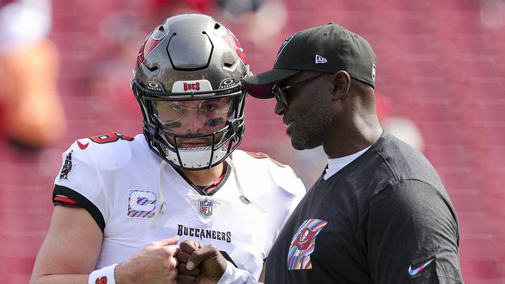 Oct 22, 2023; Tampa, Florida, USA;  Tampa Bay Buccaneers quarterback Baker Mayfield (6) speaks to head coach Todd Bowles before a game against the Atlanta Falcons at Raymond James Stadium. Mandatory Credit: Nathan Ray Seebeck-Imagn Images