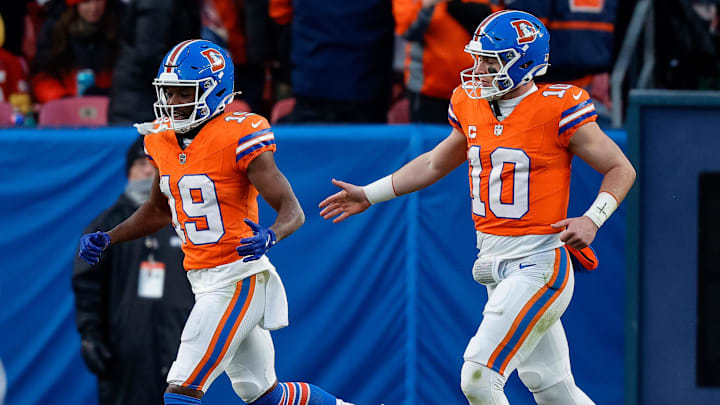Jan 5, 2025; Denver, Colorado, USA; Denver Broncos wide receiver Marvin Mims Jr. (19) celebrates his touchdown with wide receiver Lil'Jordan Humphrey (84) and quarterback Bo Nix (10) in the third quarter against the Kansas City Chiefs at Empower Field at Mile High. 